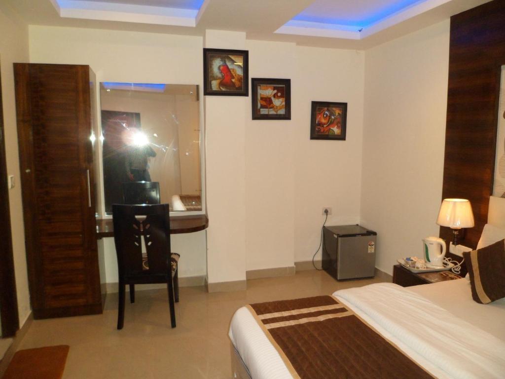 Hotel Arjun New Delhi Kamer foto